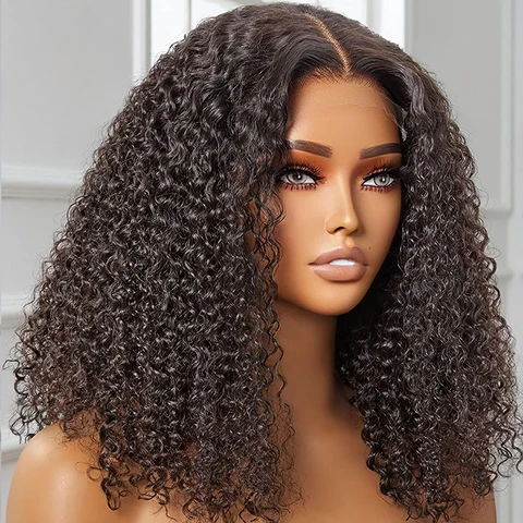 The model is showcasing our Ayanda Medi wig, which is a Kinky Curly Peruvian Frontal wig, with a 13x4 ear to ear transparent swiss lace. The wig is Premium quality - 100% raw virgin human hair with cuticles intact and aligned. It is a glue-less wig with adjustable and detachable bands. It has a pre-plucked hairline and can be customised to a ready and go wig by adding bleached knots. Comes in lengths 14” and 16” and forms part of our affordable range