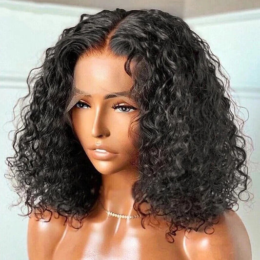 The model is showcasing our Khanya Bob wig, which is a Water Wave Peruvian Frontal wig, with a 13x4 ear to ear transparent swiss lace. The wig is Premium quality - 100% raw virgin human hair with cuticles intact and aligned. It is a glue-less wig with adjustable and detachable bands. It has a pre-plucked hairline and can be customised to a ready and go wig by adding bleached knots. Comes in lengths 10” and 12” and forms part of our affordable range