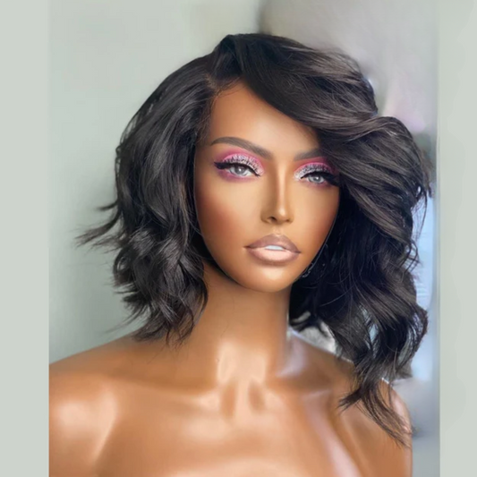 The model is showcasing our Nkazi wig, which is a Body Wave Cambodian Bob, with a choice between a 13x4 ear to ear frontal lace or 6x4 closure.  It features an undetectable HD Lace or transparent Swiss lace. The wig is part of our Premium Collection of 100% raw virgin human hair with cuticles intact and aligned. It is a glue-less, wear and go wig with adjustable and detachable bands. It comes standard with a pre-plucked hairline and bleached knots. Comes in lengths 10” and 12” 