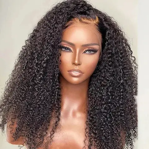 The model is showcasing Okuhle, which is a long, Kinky Curly Cambodian wig, with a choice between a 13x4 ear to ear frontal lace or 6x4 closure.  It features an undetectable HD Lace or transparent Swiss lace. The wig is part of our Premium Collection of 100% raw virgin human hair with cuticles intact and aligned. It is a glue-less, wear and go wig with adjustable and detachable bands. It comes standard with a pre-plucked hairline and bleached knots. Comes in a length of 24” 